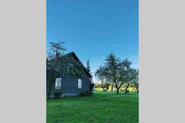 Фото номера Дом с 2 спальнями Дома для отпуска Newly renovated Latvian farm house г. Kraujas 36